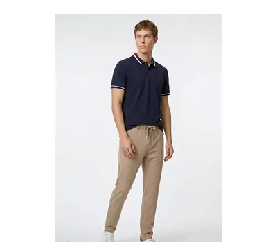 Jogger Slim Fit Dar Kesim Yan Cepli Beli Bağlamalı Bej Pantolon