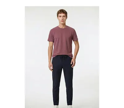 Jogger Slim Fit Dar Kesim Yan Cepli Beli Bağlamalı Lacivert Pantolon