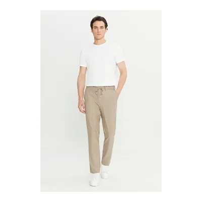 Slim Fit Dar Kesim Beli Bağlamalı Yan Cepli Gofre Desenli Esnek Bej Pantolon